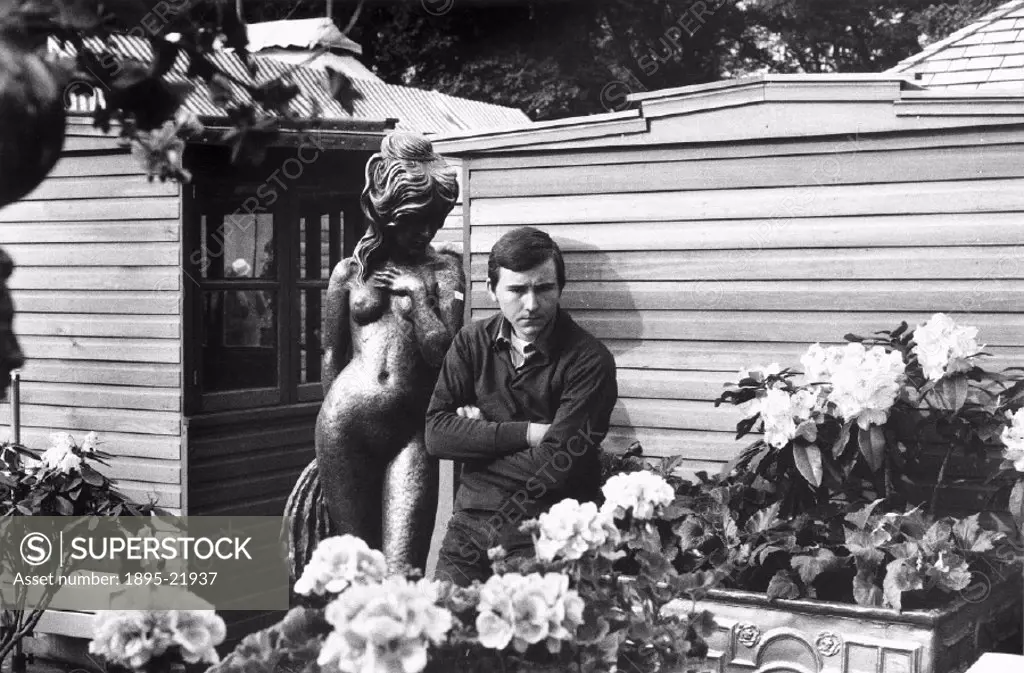 Man with statue at a flower show, c 1960s. Tony Ray-Jones (1941-1972) created most of his images of the British at work and leisure between 1966-1969....