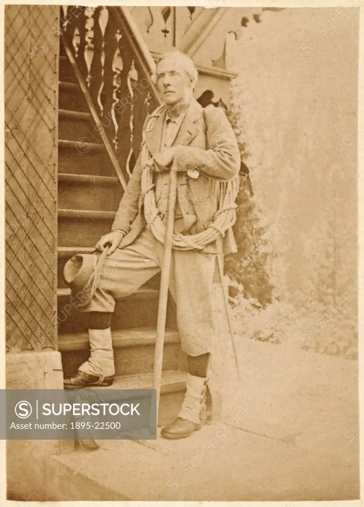 Carte de visite photograph of an unknown mountaineer wearing puttees and climbing clothing, with a length of rope over his shoulder and holding a walk...