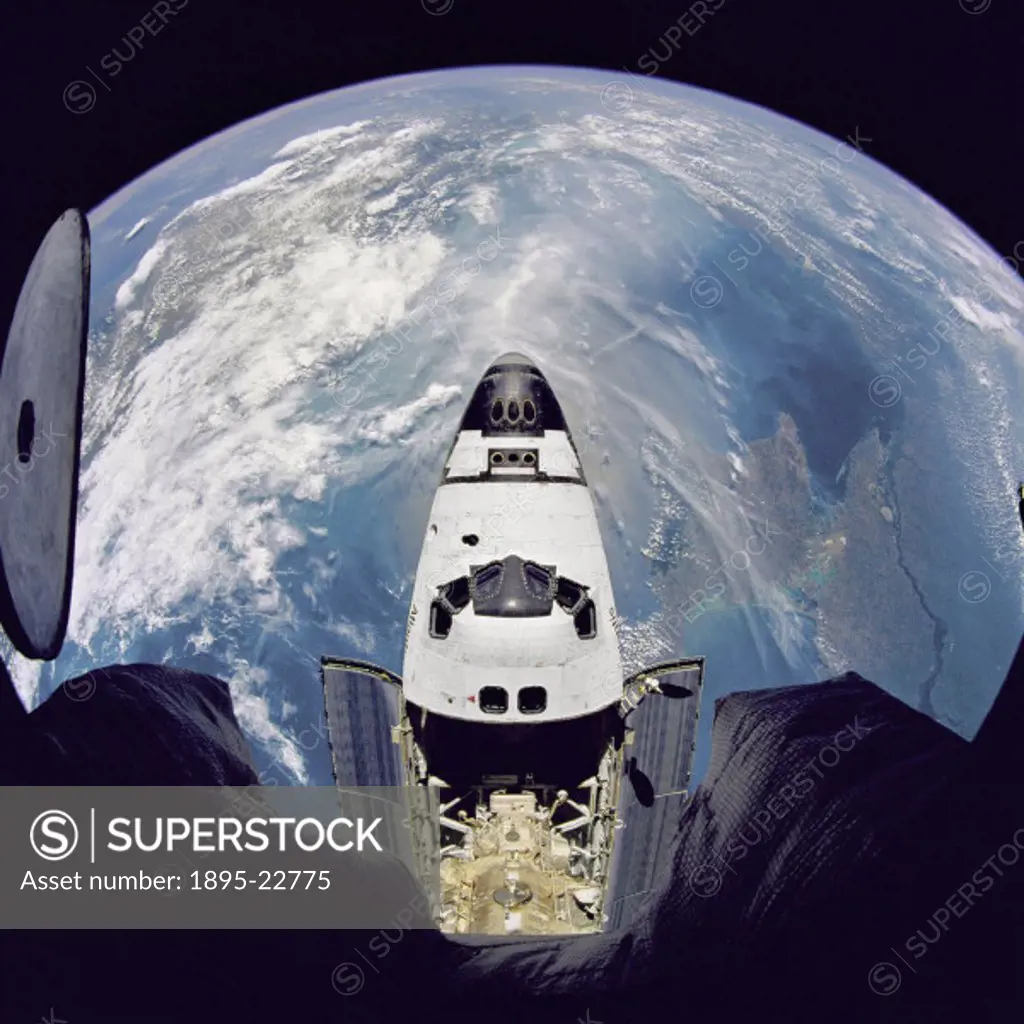 Fish-eye view of the Space Shuttle Atlantis’ as seen from the Russian Mir space station during the STS-71 mission.