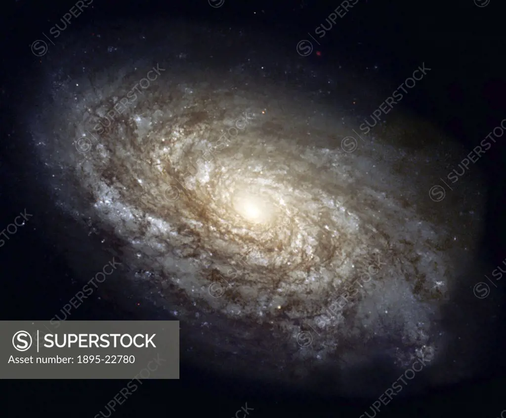 In 1995, the majestic spiral galaxy NGC 4414 was imaged by the Hubble Space Telescope. In 1999, the Hubble Heritage Team revisited NGC 4414 and comple...