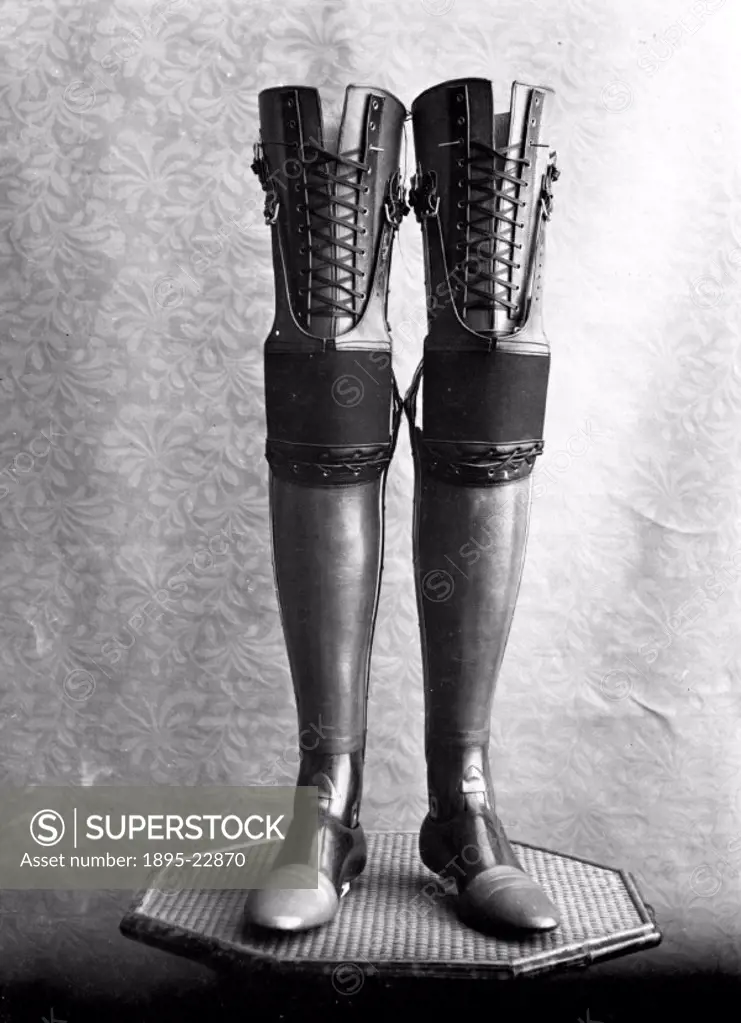 Studio photograph of a pair of artificial legs. The legs were manufactured by James Gillingham (1839-1924), a boot- and shoemaker based in Chard, Some...