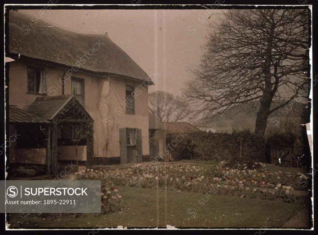 Photographed by W H Waterfield. The house in the picture no longer exists, there is now a housing estate on the site. Autochromes were the first comme...