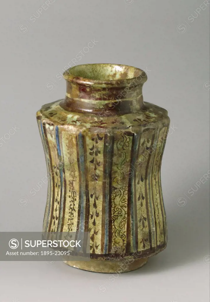 An earthenware jar used by apothecaries to store dried herbs, minerals and other medicines. The glazed surface of pottery drug jars such as this one c...