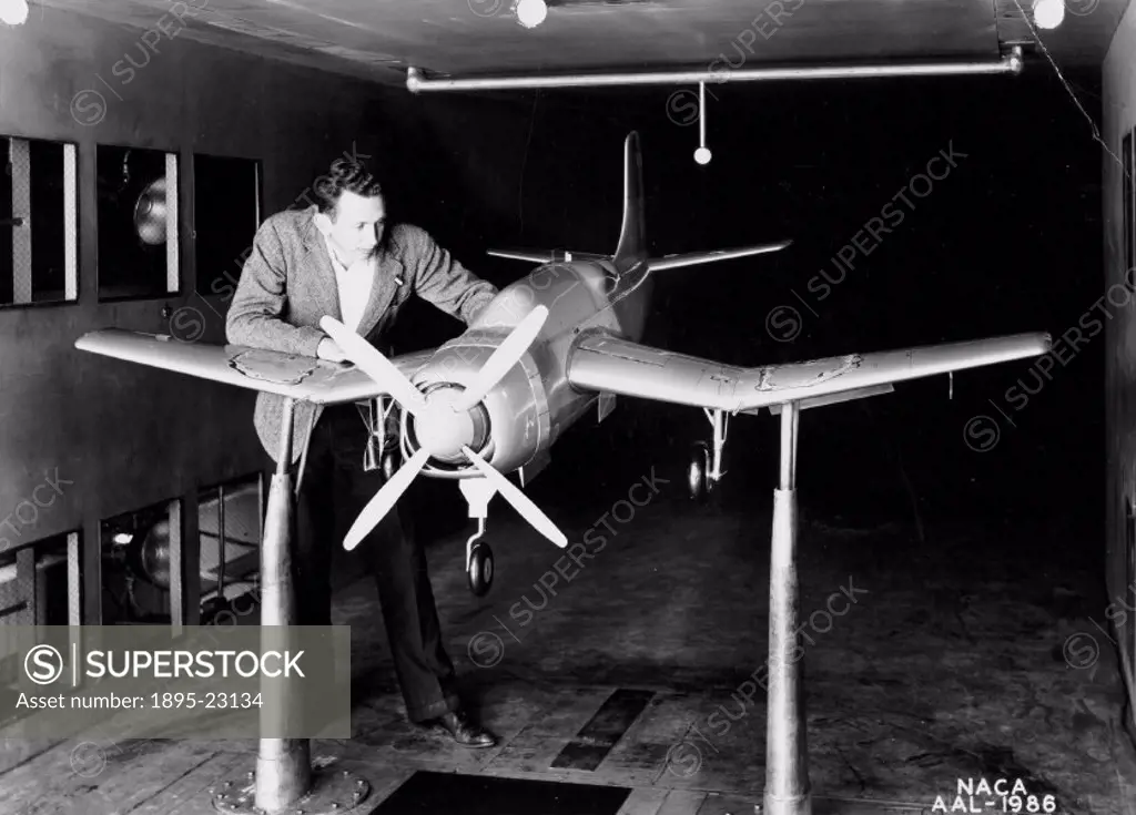 A scale model is being prepared for study in one of the 7 x 10 Foot Wind Tunnels at the NACA Ames Aeronautical Laboratory, USA.’