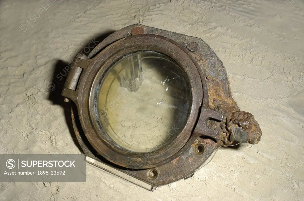 This porthole was raised two and half miles from the debris field around the Titanic’ 90 years after the ship sank, and is shown here at the Science ...