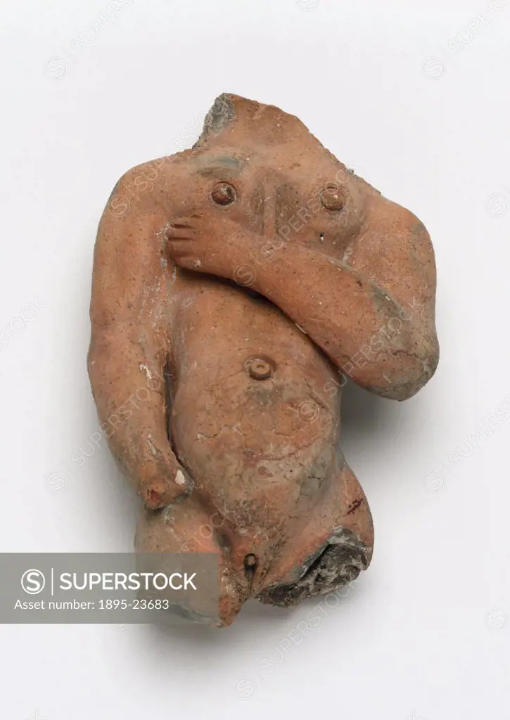 Torso of a pregnant female figure made from terracotta, said to have been found in Suffolk. Front view.