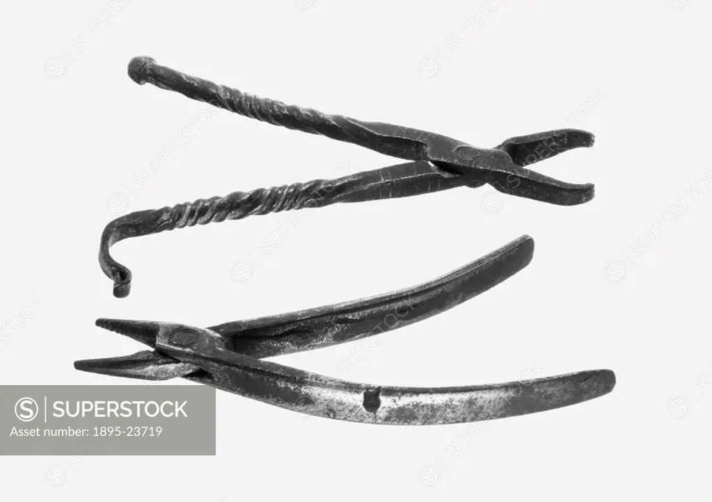 These two sets of crude iron forceps are probably both European. They would have been used for extracting teeth. One pair was owned by a Sarajevo barb...