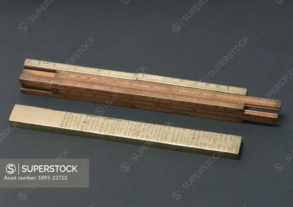 Square ullage slide rule, with additional engineering data on sliding brass scales, made by Edward Roberts of Dove Court, Old Jewry, London. Ullage is...