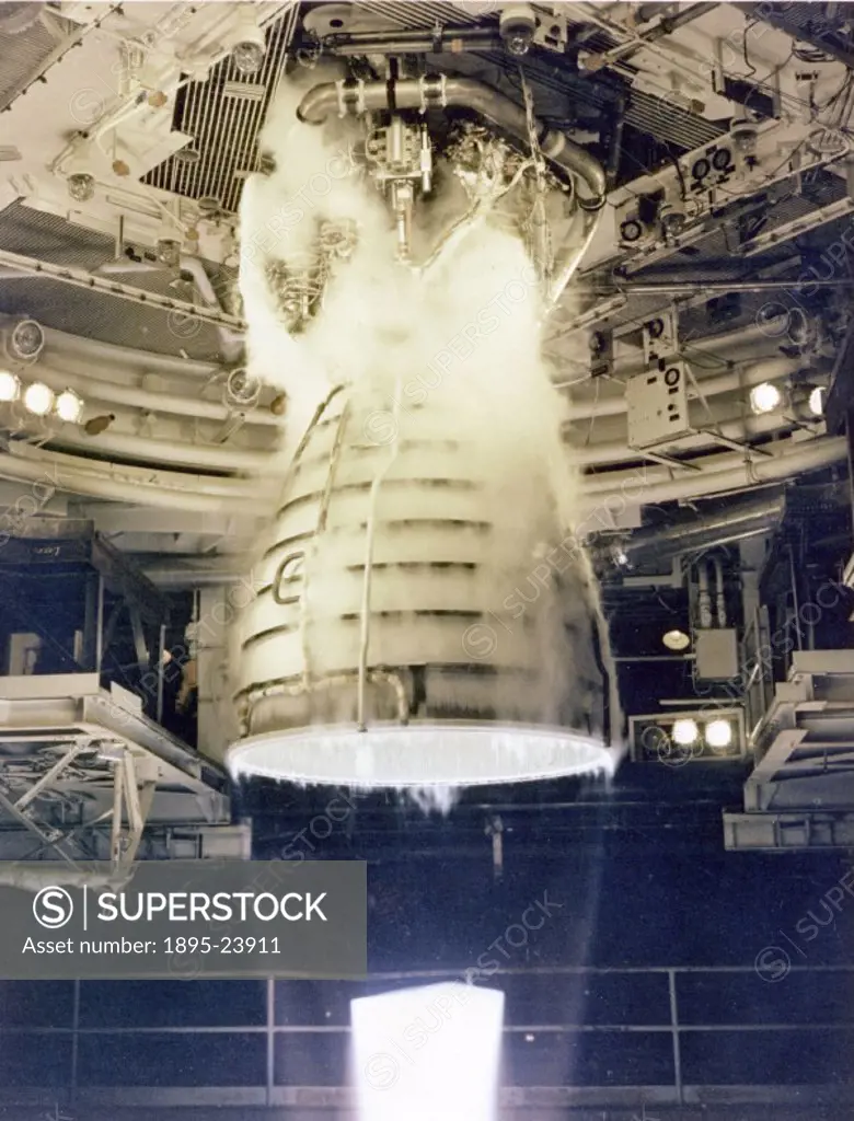 A Space Shuttle Main Engine (SSME) undergoing a full power level 290.04 second test firing at the National Space Technology Laboratories (currently c...