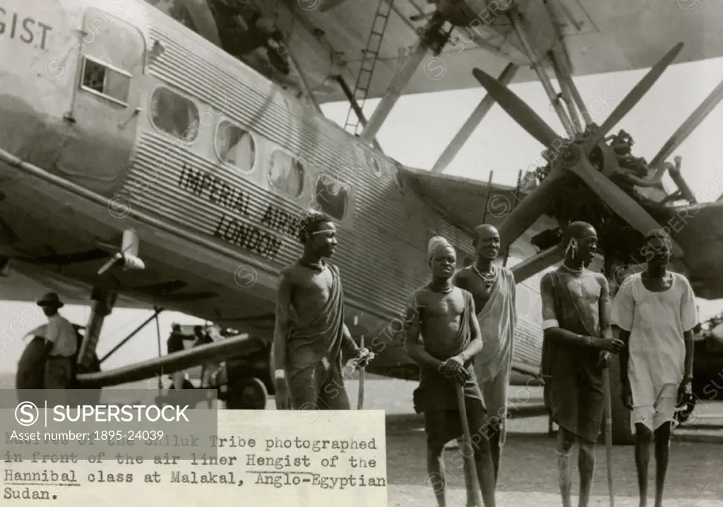 HP42 G-AAXE ´Hengist´ at Malakal in Anglo-Egyptian Sudan with natives of the Shiluk tribe. The Handley Page HP42 was the most famous Imperial Airways ...