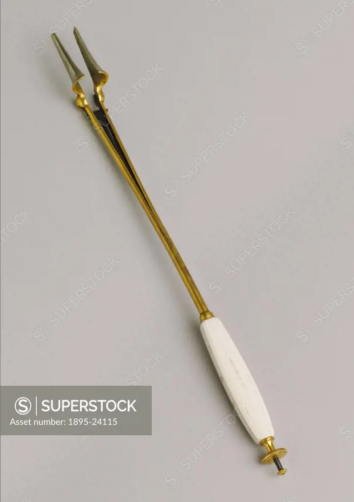 This instrument has a spring mechanism for the blades and is gold-plated with an ivory handle. It was manufactured by Collin of Paris, France and is f...