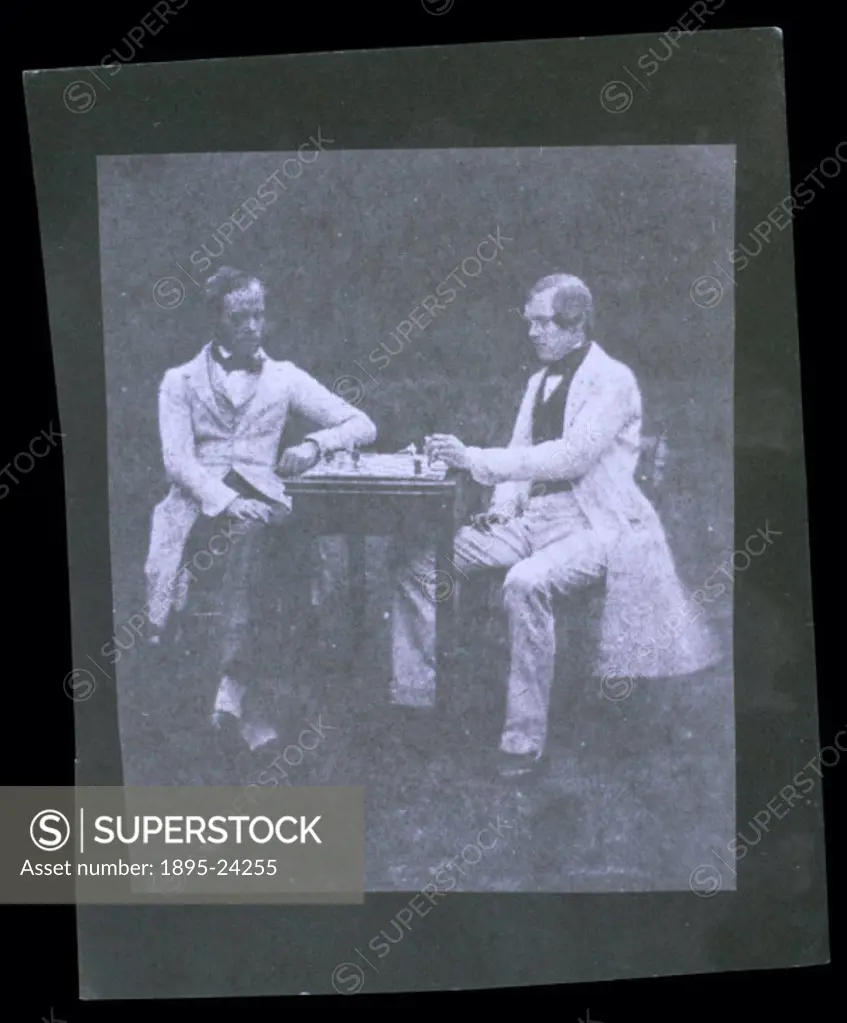 Photograph by William Henry Fox Talbot (1800-1877) showing a game of chess, probably between Henneman and Pullen. Talbot invented the first negative/p...