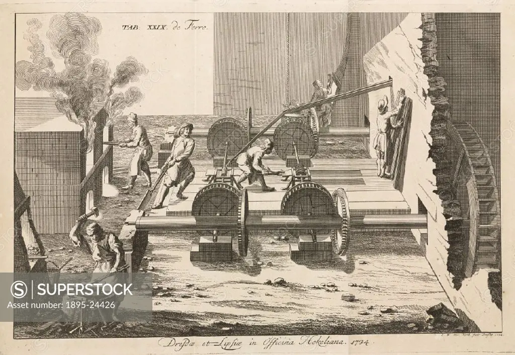 Engraving showing  metalworkers heating, hammering and shaping iron. The waterwheel powers rollers used to flatten the metal into sheets.  from Regnu...