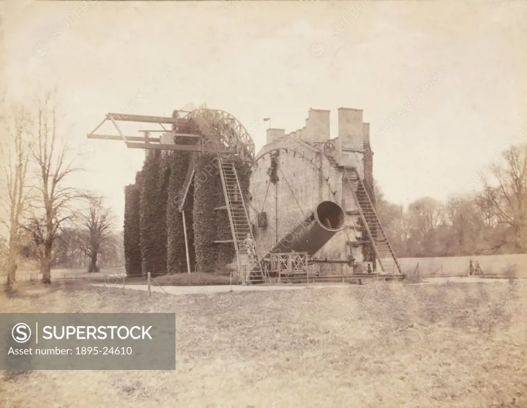 One of two photographs showing views of the Great Rosse reflecting telescope, taken by Lieutenant Colonel Harry J Watson (who can just be seen, seated...