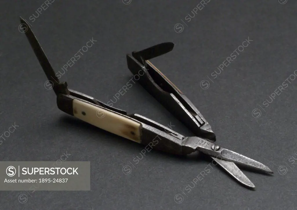 Steel, bone and brass scissors with folding knife blades within the handles.