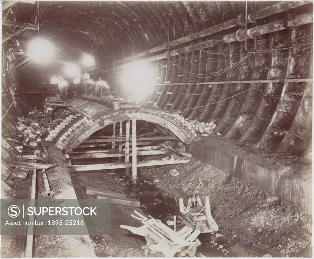 Tunnel under river showing subway arch in course of construction’, one of a series of 50 photographs chronicling the construction of the Rotherhithe ...