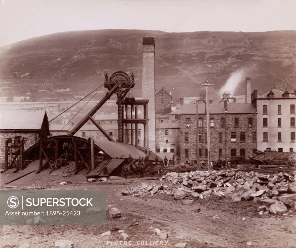 Albumen photographic print showing the pit head, winding gear and cottages of Pentre Colliery in Wales.