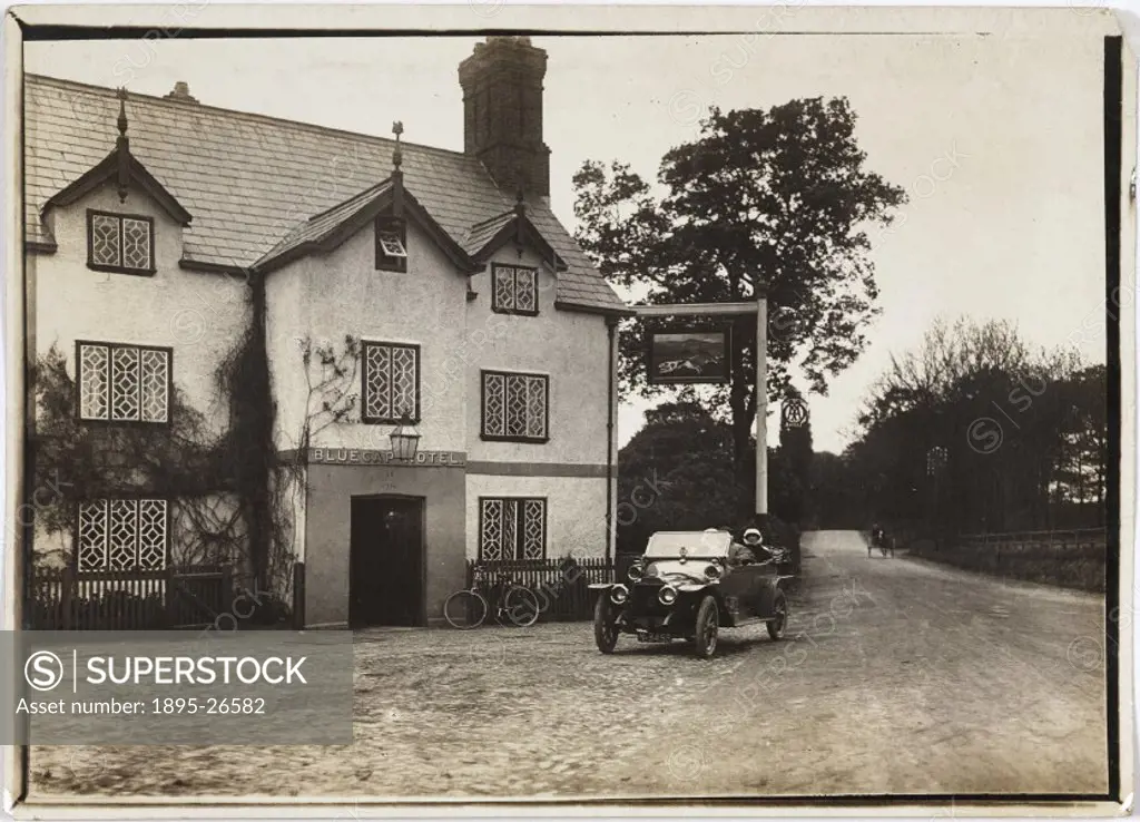Photograph by H Wade showing a car parked outside the Blue Cap Hotel, Sandiway, Northwich, Cheshire.