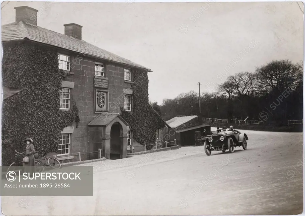 Photograph by H Wade showing a car passing the Vale Royal Abbey Arms Hotel, Northwich, Cheshire.