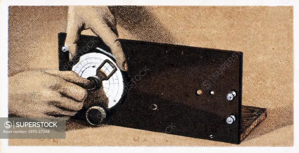 How to build a two valve set’, No 5, Godfrey Philips cigarette card, 1925. The reverse of the card reads: Fixing slow motion dial. This picture show...