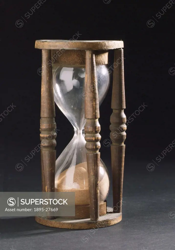 Wooden, 15 minute (average) sand glass from the second half of the 18th century. Sand glasses were made to measure out a specific length of time. They...