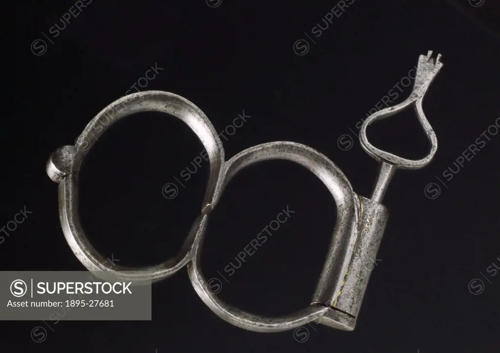 Restraining device consisting of a pair of strong connected hoops which would be locked around the wrists and used on either one or both arms of a pri...