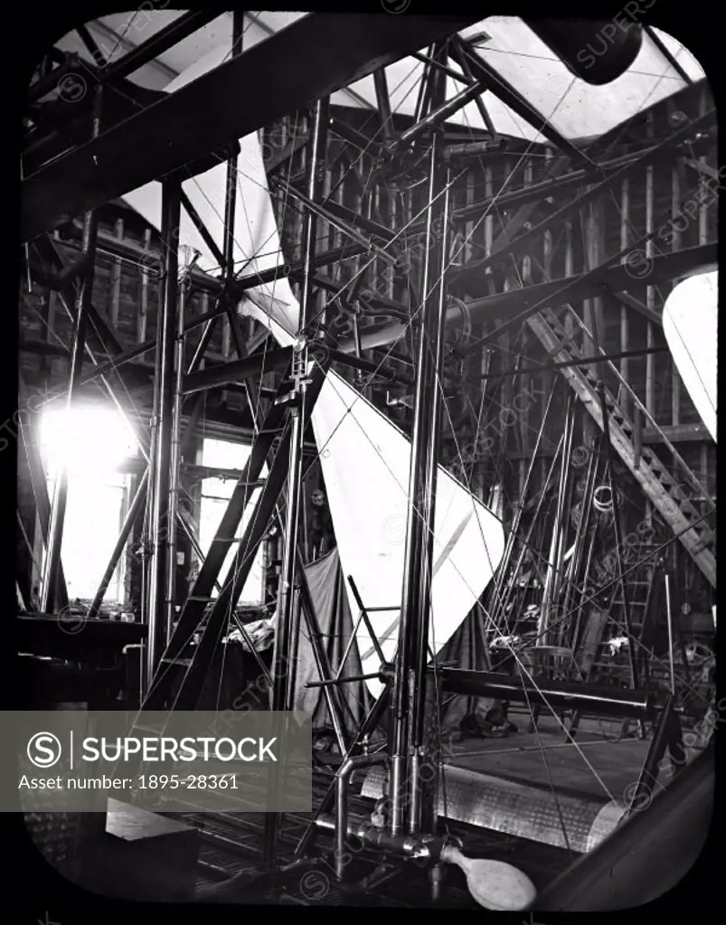 Photograph taken during the assembly of the aircraft. Sir Hiram Stevens Maxim (1840-1916) designed and built this flying machine in 1893-1894. He had ...