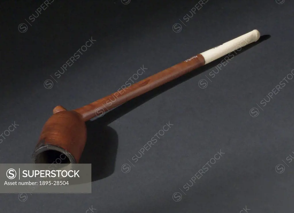 Pipe made from wood with an ivory mouthpiece. The design is an exaggerated imitation of Dutch clay pipe of 17th century.