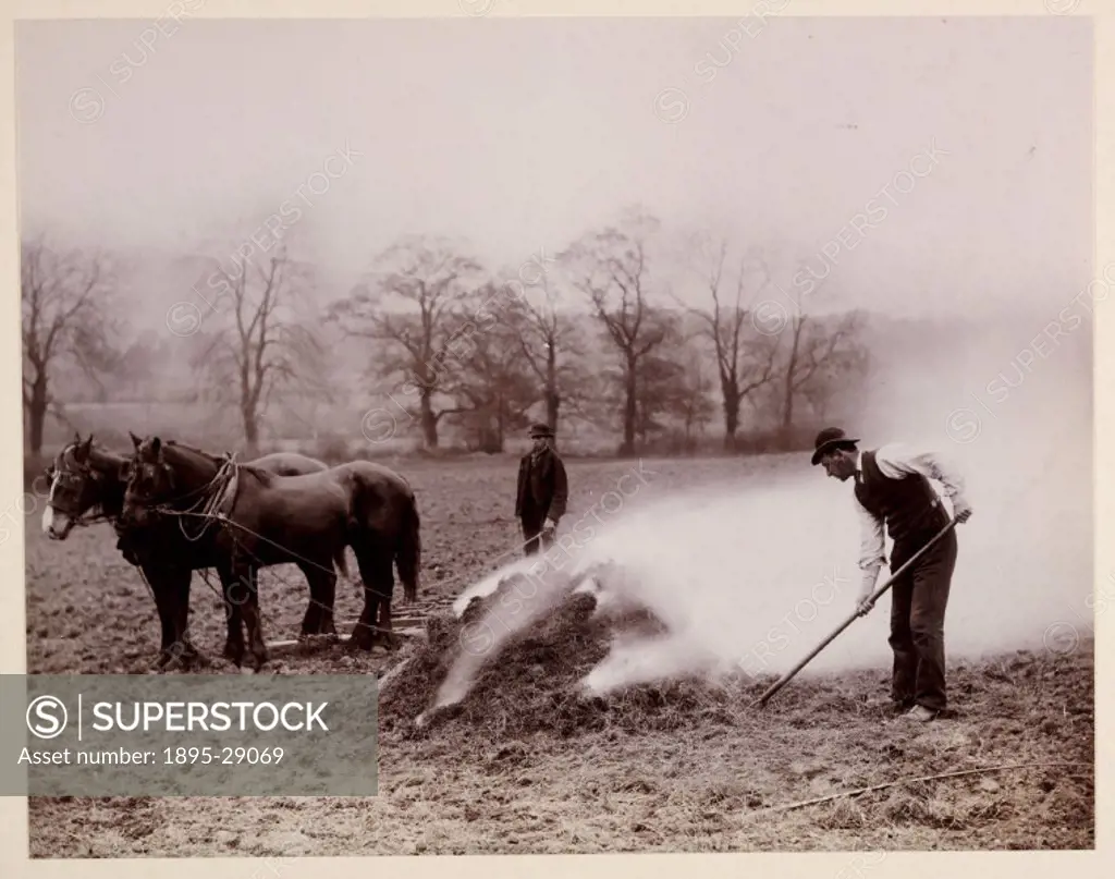 A photograph of an agricultural scene, taken by George Davison 1854-1930 in 1888.  An agricultural worker is shown in the field burning stubble or ´...