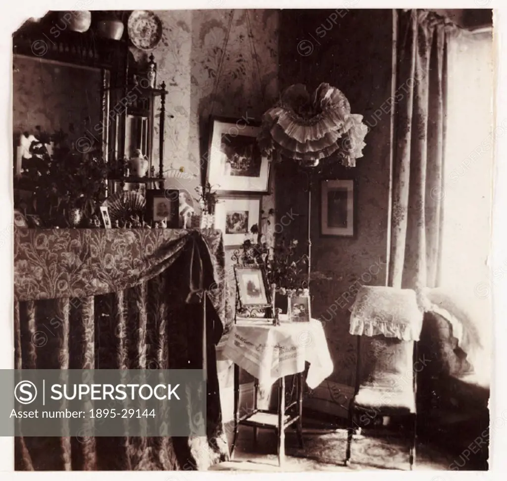 Photograph by Frank Meadow Sutcliffe (1853-1941), a perfect example of a typical Victorian parlour. The parlour was a room used to entertain or have a...