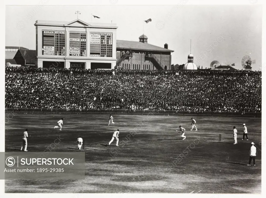 A snapshot photograph of the Fifth Test between England and Australia played at Sydney, Australia,  taken by an unknown photographer in 1930.  Crowds ...