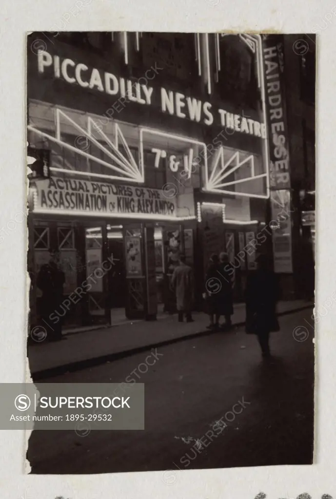 A snapshot photograph of the Piccadilly News Theatre at night, taken by an unknown photographer in 1934. News theatres which showed newsreels played a...