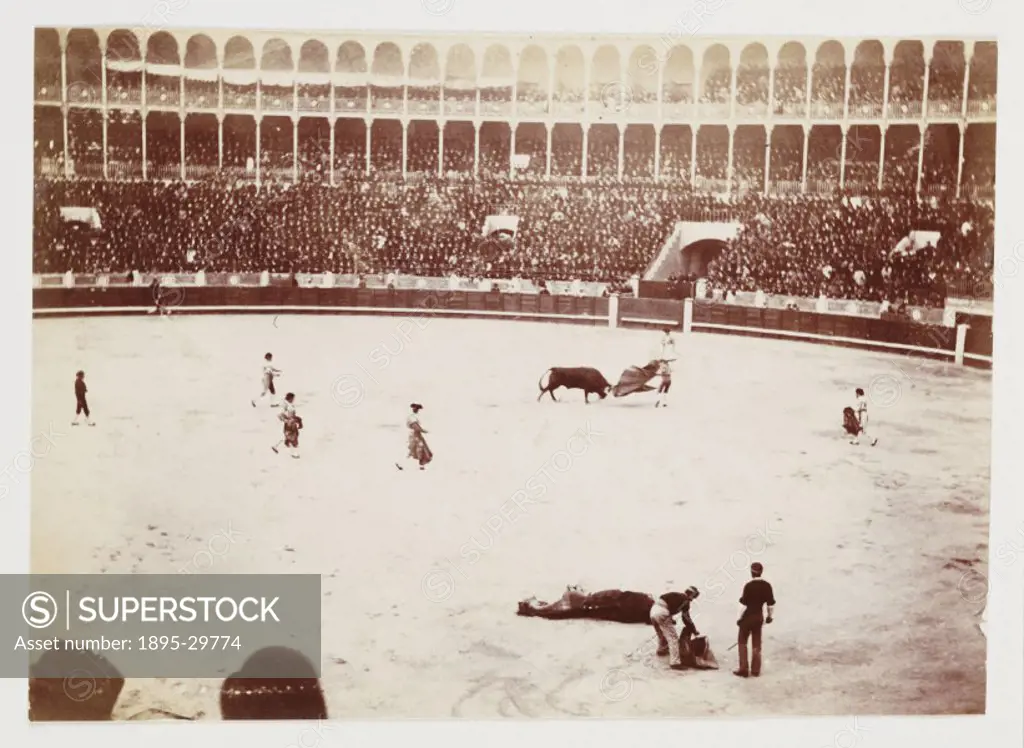 A snapshot photograph of a bullfight in front of a huge crowd in the Las Ventas del Espiritu Santo bullring, Madrid, taken by an unknown photographer ...