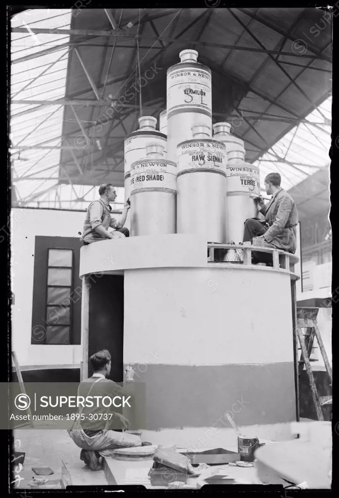 A photograph of final preparations for the British Industries Fair, held at Olympia, taken by James Jarche (1891-1965) for the Daily Herald newspaper ...