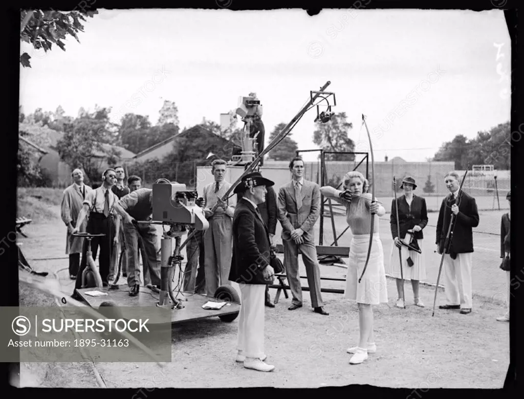 This outside broadcast from an archery range in Roehampton, Greater London, was part of a series of BBC programmes demonstrating various sports. Jasmi...