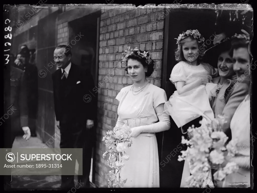 A photograph of Princess Elizabeth as bridesmaid to Hon. Mrs. Vicary Gibbs and Captain Hon. A.G.V. Elphinstone, at the Savoy Hotel in London after the...