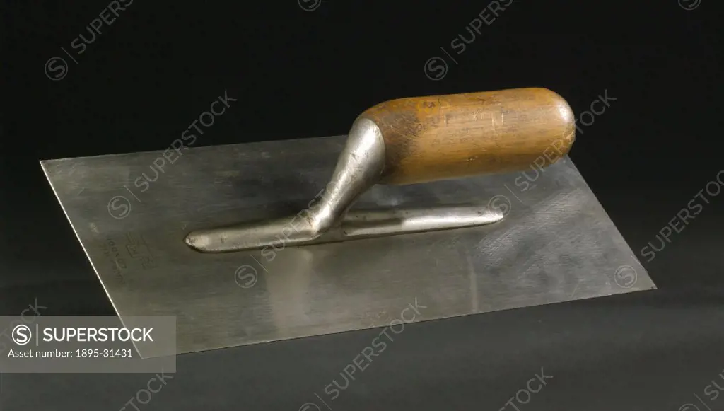 Metal trowel used for the application and smoothing of plaster. Made by Buck and Hickman, London.