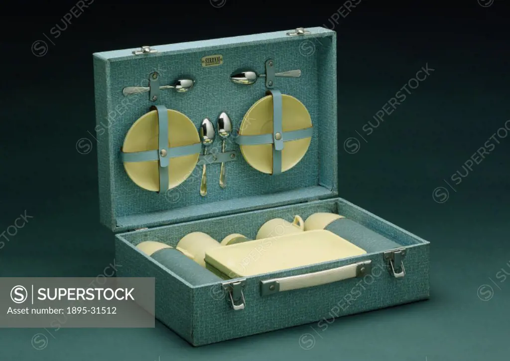 Picnic set comprising two thermos flasks, a sandwich tin, storage jar, four cups and saucers and four spoons. In the post war period, with more time f...