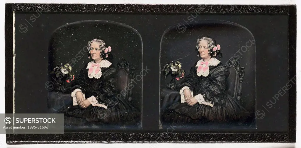A hand-coloured stereoscopic portrait of a woman by John Jabez Edwin Mayall (1813-1901). Although born in England, Mayall began his photographic caree...