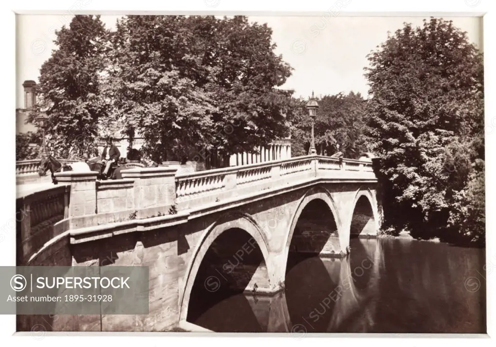 A photographic view of the Victoria bridge joining the two parts of Royal Leamington Spa, published by Francis Bedford & Co, in about 1880.  The openi...