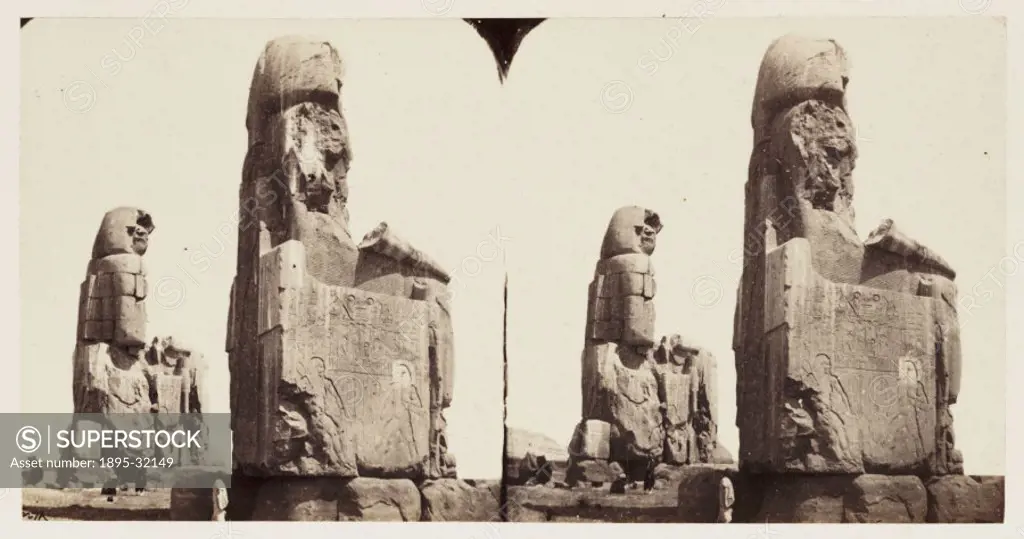A stereoscopic photograph of two giant seated statues at Thebes, Egypt, taken in 1859 by Francis Frith (1822-1898). This image is from a series of one...