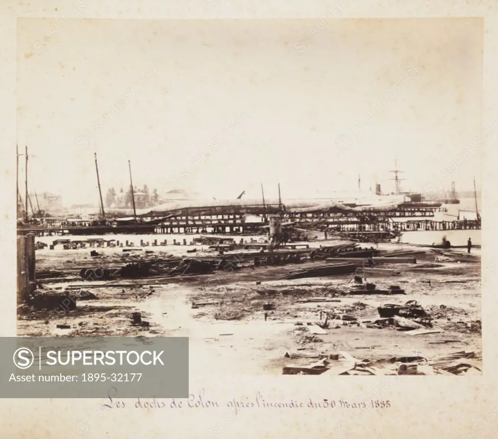 A photograph of the docks at Colon, Panama, following a fire in March, 1885, taken by an unknown photographer. This photograph is from an album docume...