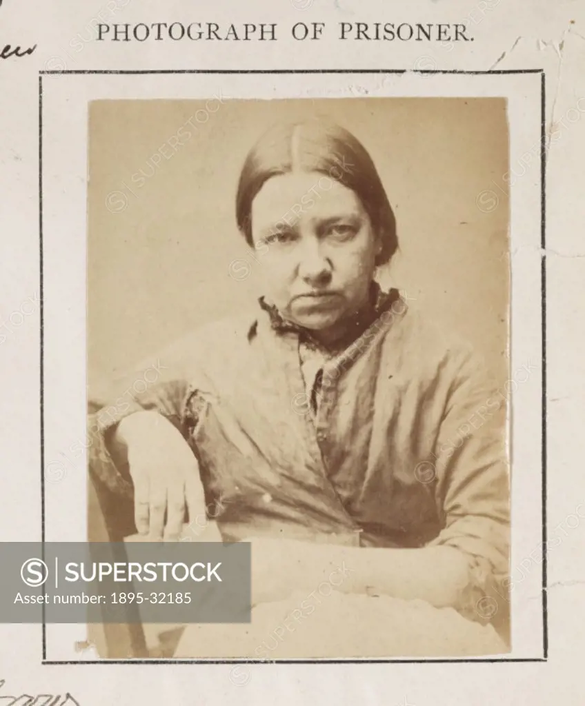 An identity photograph of a convicted criminal, Hannah Buckham, from an album of prison record photographs,  taken by an unknown photographer in 1873....