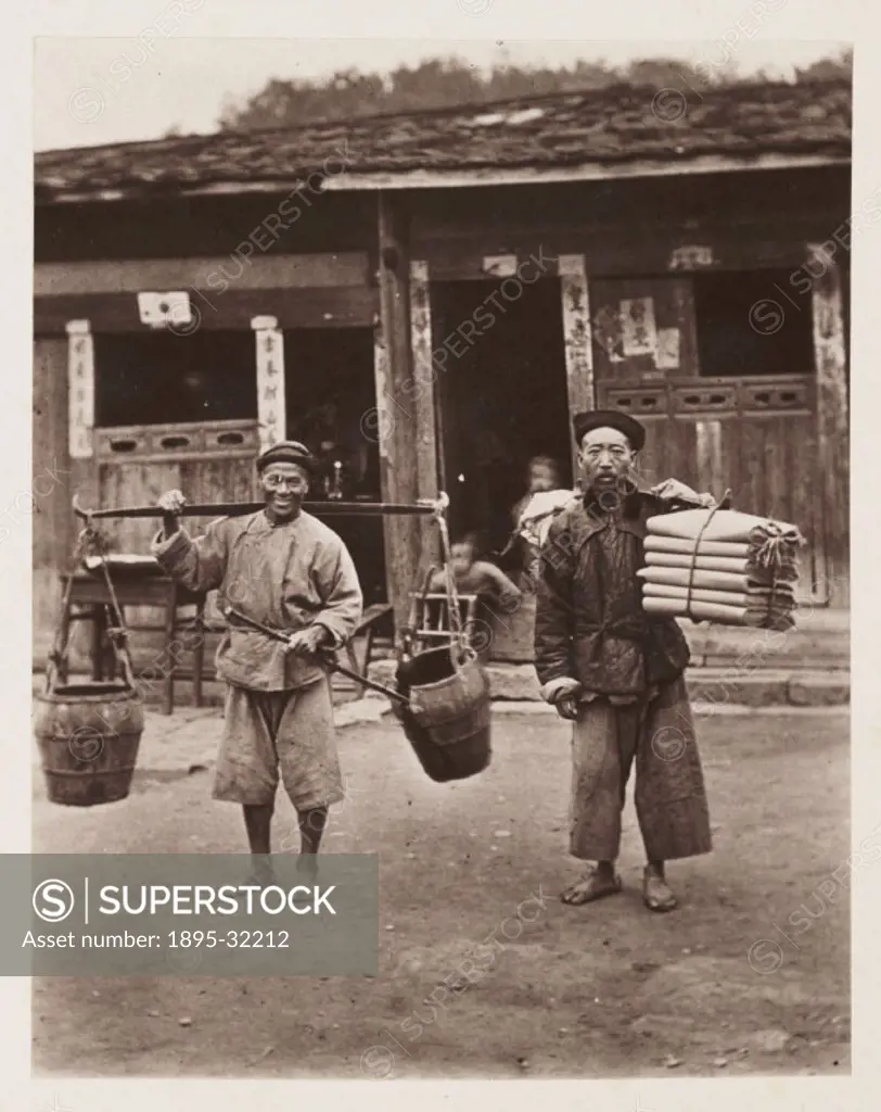 A photograph of two Chinese labourers, taken by John Thomson 1837-1921 in about 1871, published in 1873 in the book ´Foochow and the River Min´.  Th...
