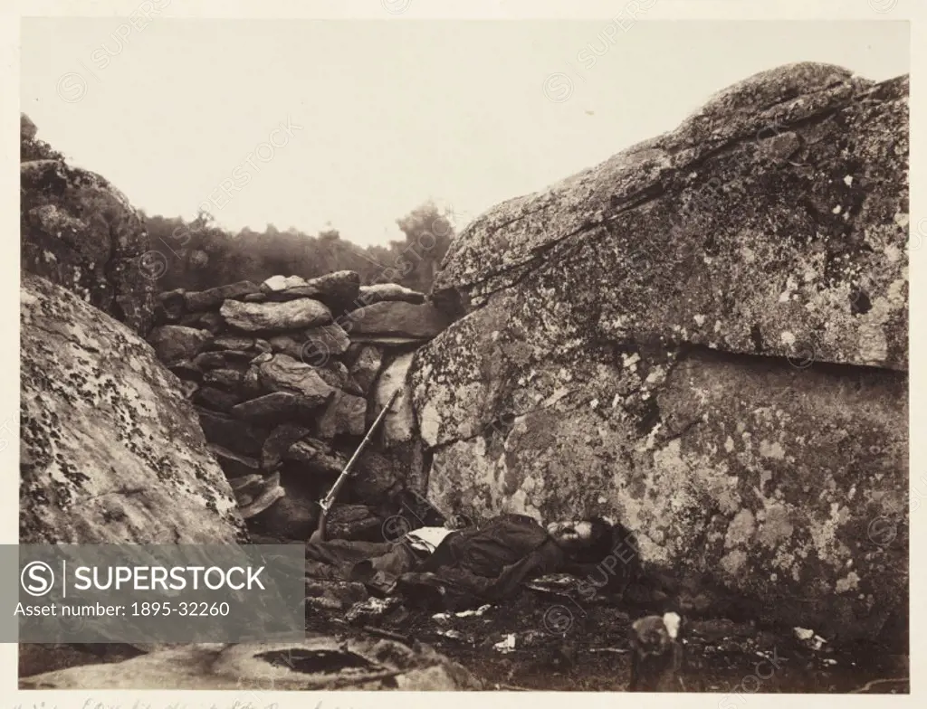 A photograph of a dead soldier at Devil´s Den on the battlefield at Gettysburg in Pennsylvania, America, by Alexander Gardener (1821-1882) from a nega...