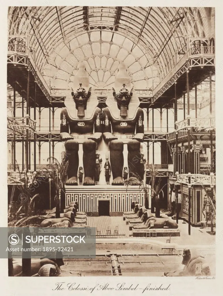 Replicas of monumental Ancient Egyptian sculptures, painted and on display. Chairs in the foreground give an idea of the scale. The Crystal Palace was...