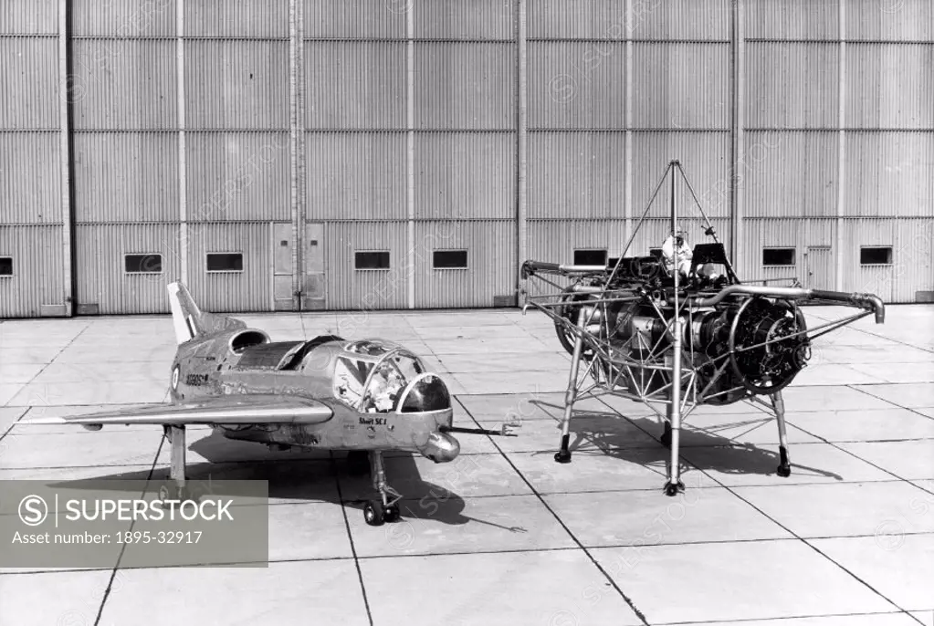 Rolls-Royce Thrust Measuring Rig (TMR) parked alongside the Short SC1 VTOL research aircraft. The TMR or ´Flying Bedstead´ was used to test the princi...