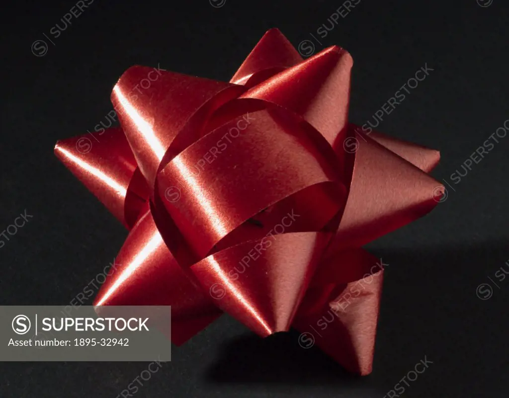 Red decorative bow made of expanded and orientated polypropylene.