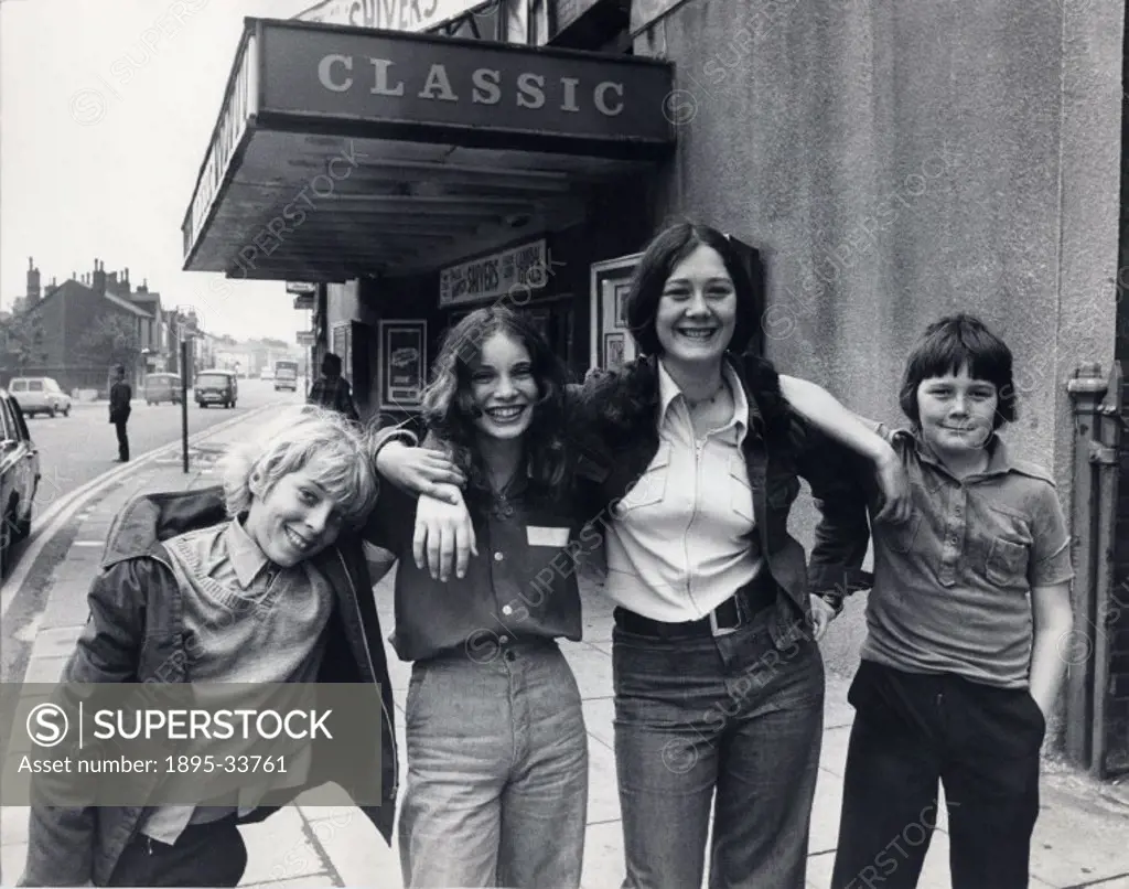 ´A victory celebration in ´pop´ for the campaigning children who have saved their local Classic cinema. Left to right: Michael Speakman (12), Angela J...