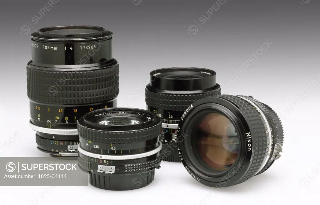 Selection of Nikkor bayonet fitting lenses for 35mm camera systems, c 1980s.
